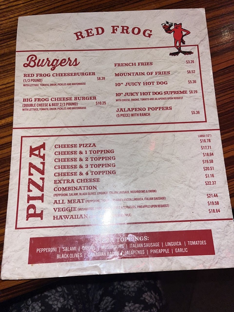 Menu board for burgers, pizza, and cocktails.